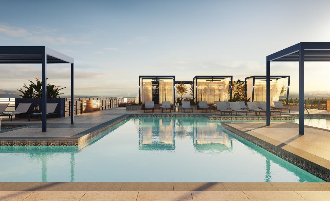 a swimming pool with a building in the background
